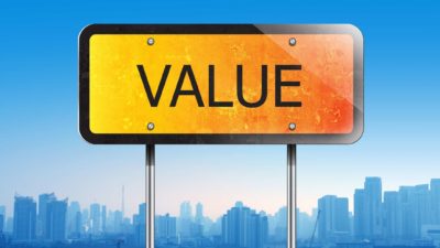 ASX 200 mining shares value buy An orange sign with the word value against a blue cityscape, representing ASX value shares