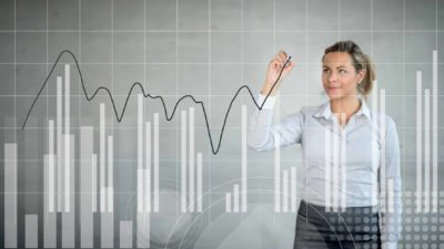 rising share price represented by line drawn by person