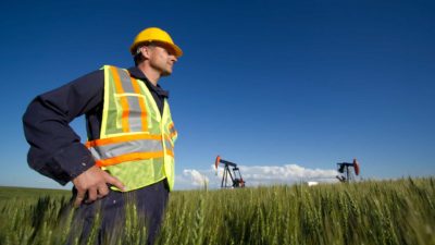 hard hat worker at green mining site