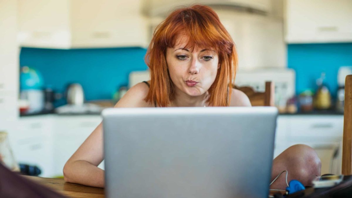 unhappy investor considering computer screen