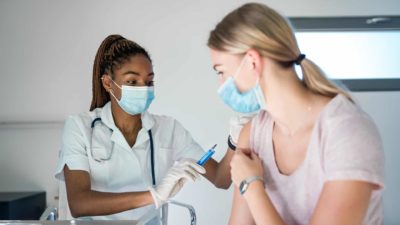 Woman getting vaccination