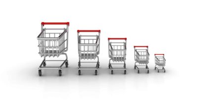 a row of supermarket shopping trollies going from large to small