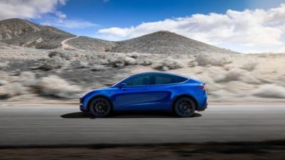 Blue Model Y Tesla vehicle
