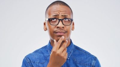 man with his hand on his chin wondering about the AIM share price