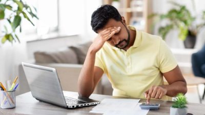 unhappy investor, sad investor, nervous investor, financial stress, unhappy work from home