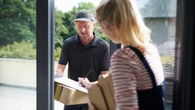 woman receiving amazon parcel