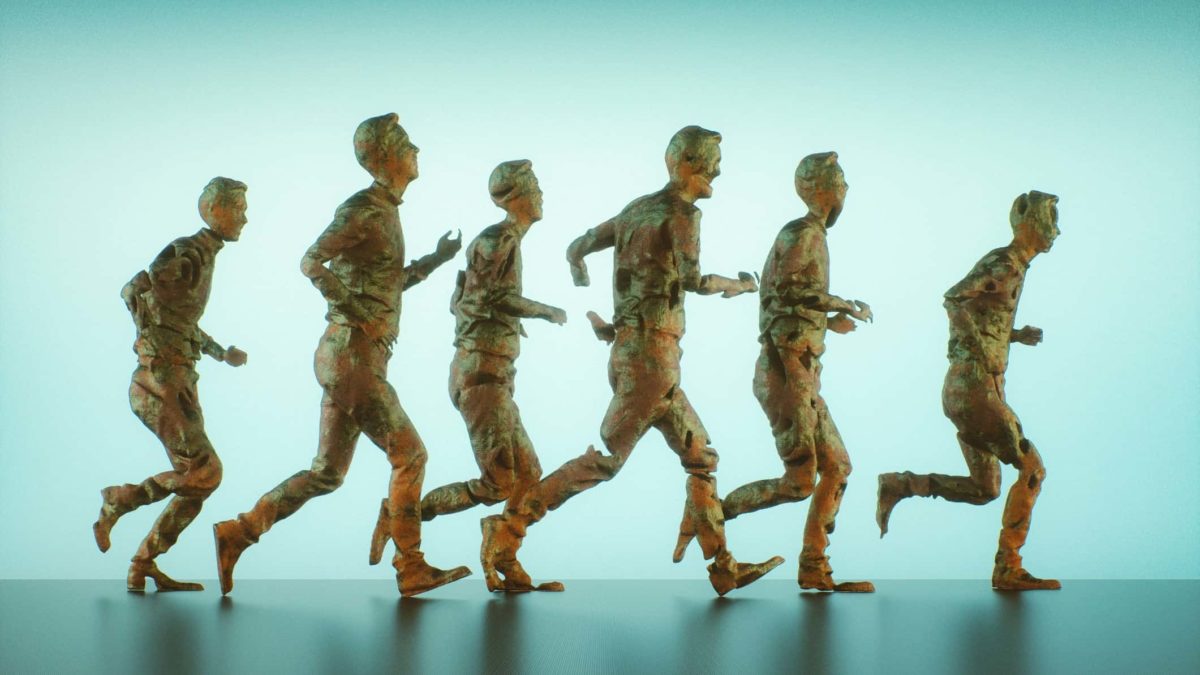 a group of six sculptures of human figures running in the same direction.