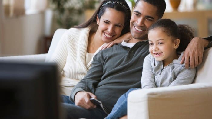 Family enjoying watching Netflix.