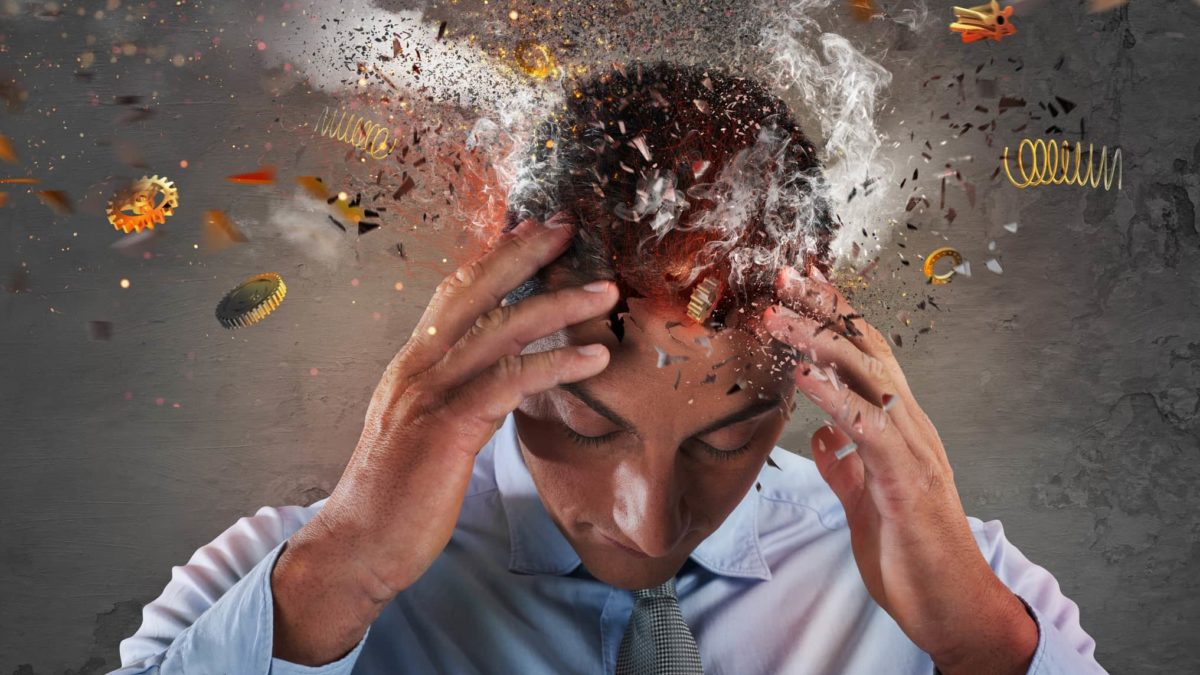 A businessman's head explodes.
