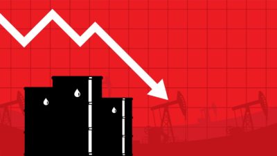 An image showing a red graph with a white arrow pointing downwards above three black barrels of oil to represent falling oil prices and ASX 200 energy shares