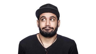 A guy shrugs his shoulders, not sure which is the right decision.