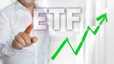 ETF spelt out with a rising green arrow.