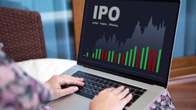 IPO spelt out on a laptop with a red and green bar chart underneath.