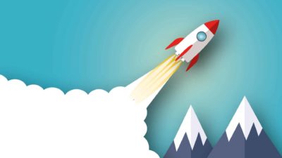 Rocket going up above mountains, symbolising a record high.