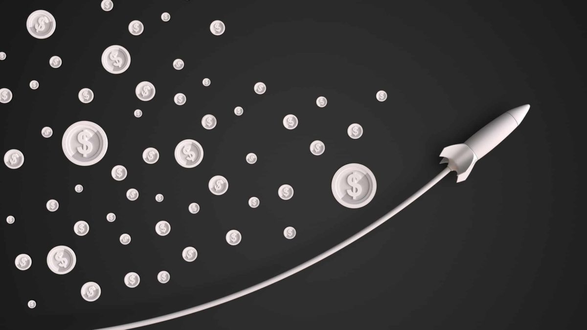 Rising rocket with dollar signs.