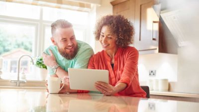 A xouple consider the pros and cons of taking out a loan